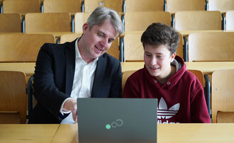 Symbolbild der beiden Beteiligten