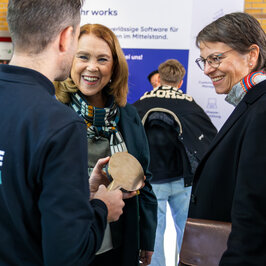 Conversation at an exhibition stand