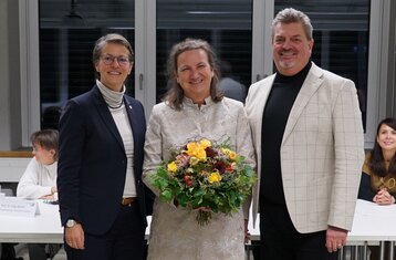 The president, the outgoing chancellor, and the chair of the Board of Governors