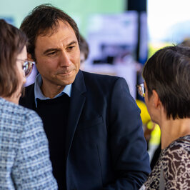 People conversing in the Festival Hall
