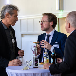 People conversing in the Festival Hall