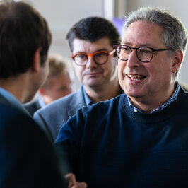 People conversing in the Festival Hall