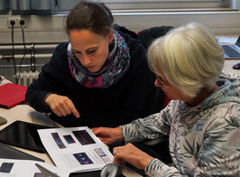 Two teachers looking at a document