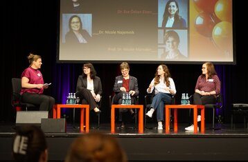 Photo of women in discussion