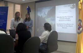 Two students making a powerpoint presentation