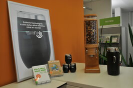 Nut dispenser and coffee mugs with HFU logo