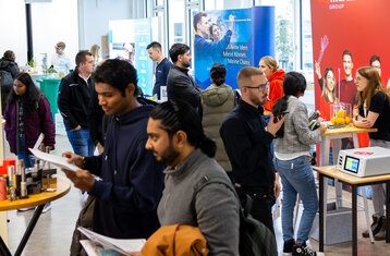 Students at the exhibition stands
