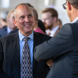 People conversing in the Festival Hall