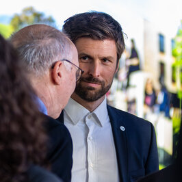 People conversing in the Festival Hall