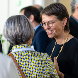 People conversing in the Festival Hall