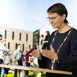 President Dr Bormann on the stage giving her speech